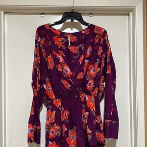 NWOT free people blouse with beautiful floral print and cinch waist size…